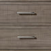 Modern three-drawer dresser in a grey and pewter finish, offering sleek metal handles and ample storage for bedroom essentials, Detail View 3.