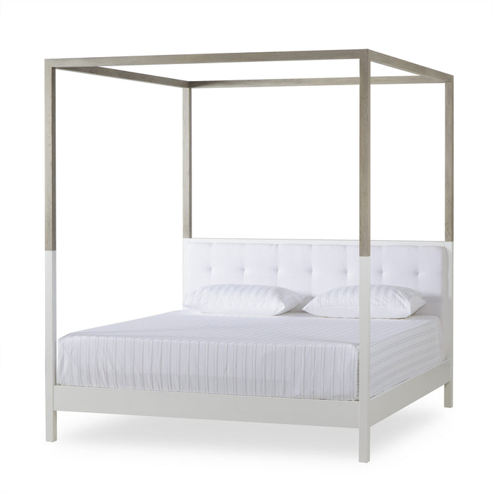 UK King size four-poster bed with a sleek, modern design, featuring a wooden frame in natural hues, offering a contemporary and comfortable addition to any bedroom, Angle View 2.