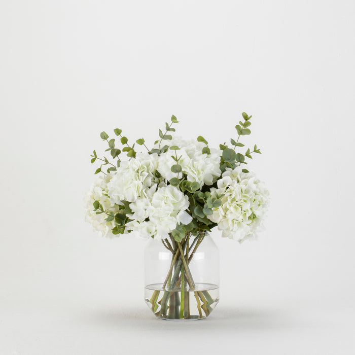 White Hydrangea Eucalyptus Bouquet in Glass Vase