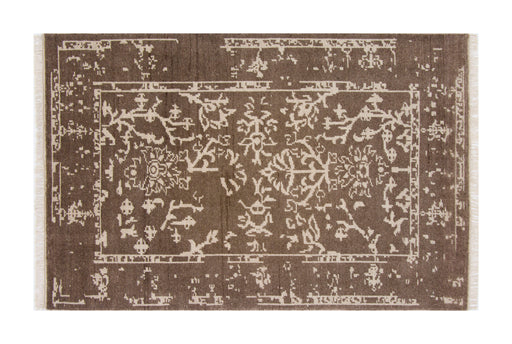Traditional patterned area rug in earth tones, ideal for adding a classic touch to any room's decor.