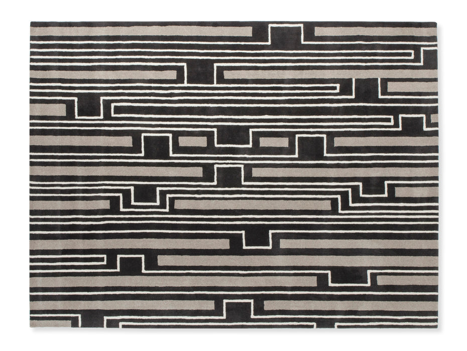 Modern geometric rug featuring black and grey horizontal lines, offering a sleek and contemporary touch to any living space.